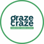 High-quality charcuterie boards and boxes offered by Graze Craze, a franchise under United Franchise Group, specializing in gourmet snack platters for events and gifting.