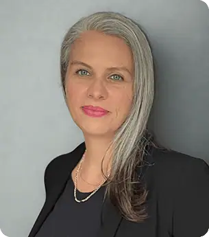 Professional portrait of Christina Parsons, a representative of United Franchise Group, with a confident expression and professional attire.